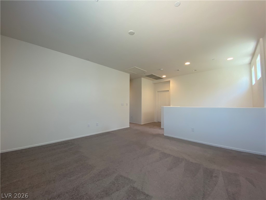 436 Cadence View Way Henderson, NV 89011 - Photo 16 of 36 A spacious and versatile loft area provides an additional living space.