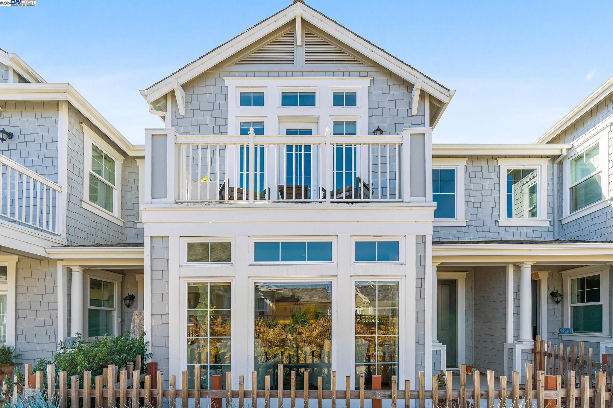 a front view of a house with a glass windows