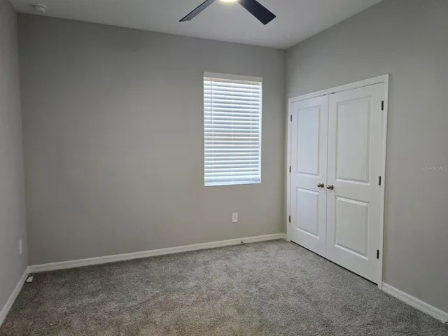 a bathroom with a sink double vanity and a mirror