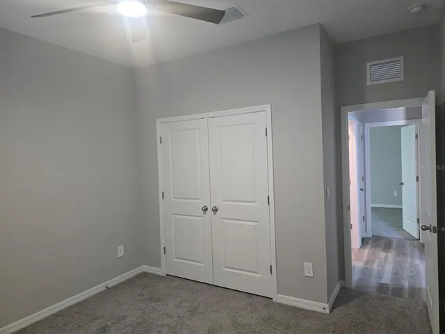 an empty room with closet