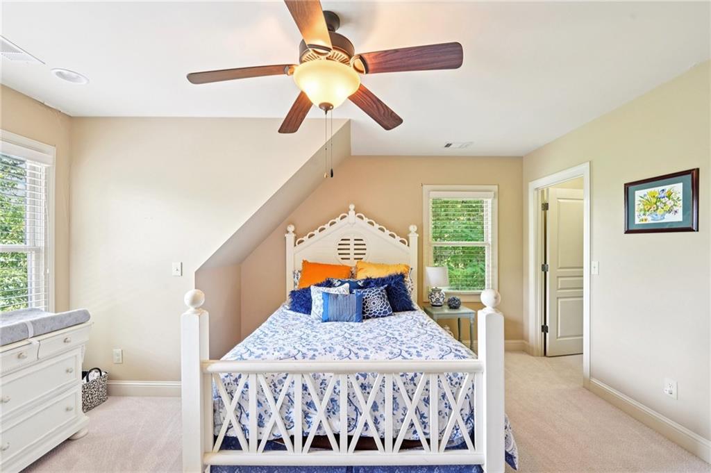 44 Sassafras Ridge Big Canoe, GA 30143 - Photo 34 of 107 a bedroom with a bed and a window