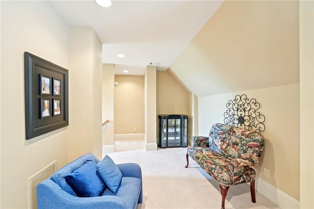 44 Sassafras Ridge Big Canoe, GA 30143 - Photo 41 of 107 a living room with furniture and a large window