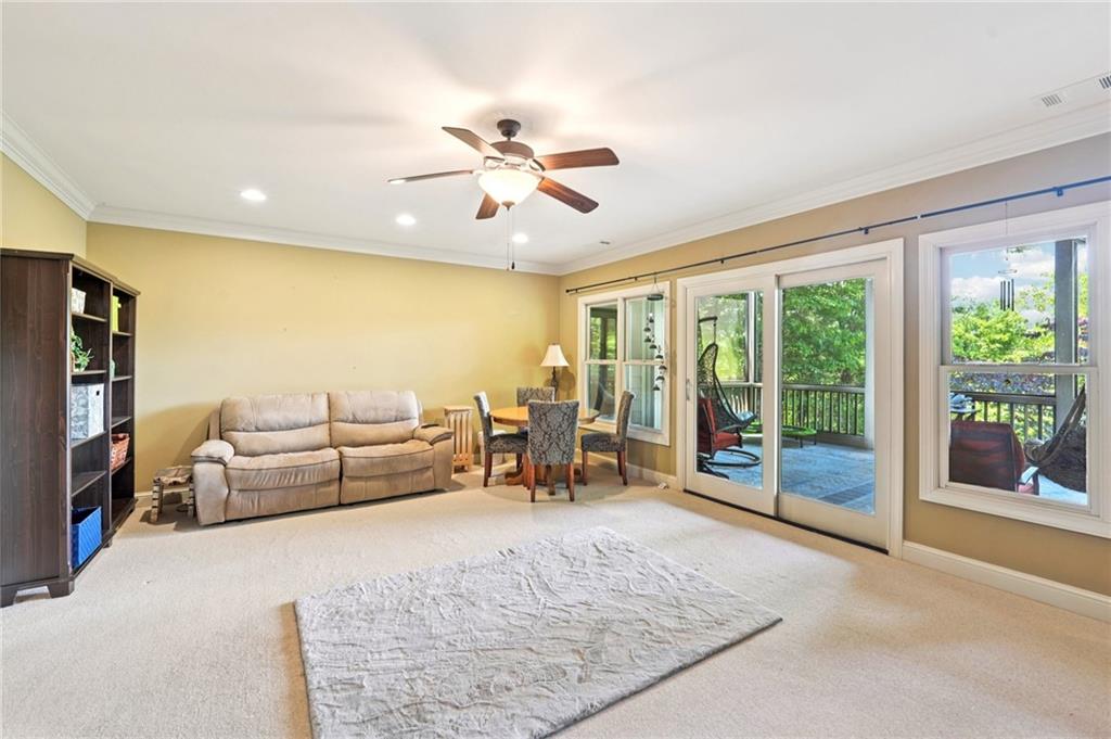 44 Sassafras Ridge Big Canoe, GA 30143 - Photo 48 of 107 a living room with furniture and large window