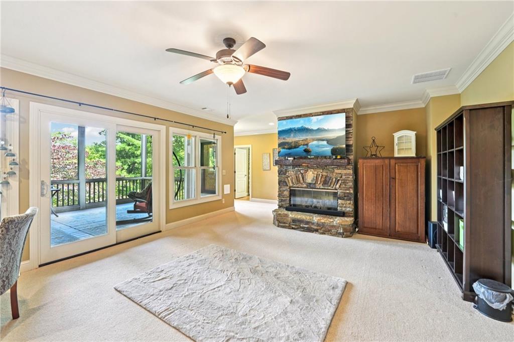 44 Sassafras Ridge Big Canoe, GA 30143 - Photo 49 of 107 a view of an empty room with a fireplace
