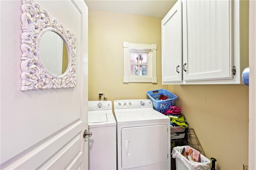 44 Sassafras Ridge Big Canoe, GA 30143 - Photo 55 of 107 a utility room with dryer and washer