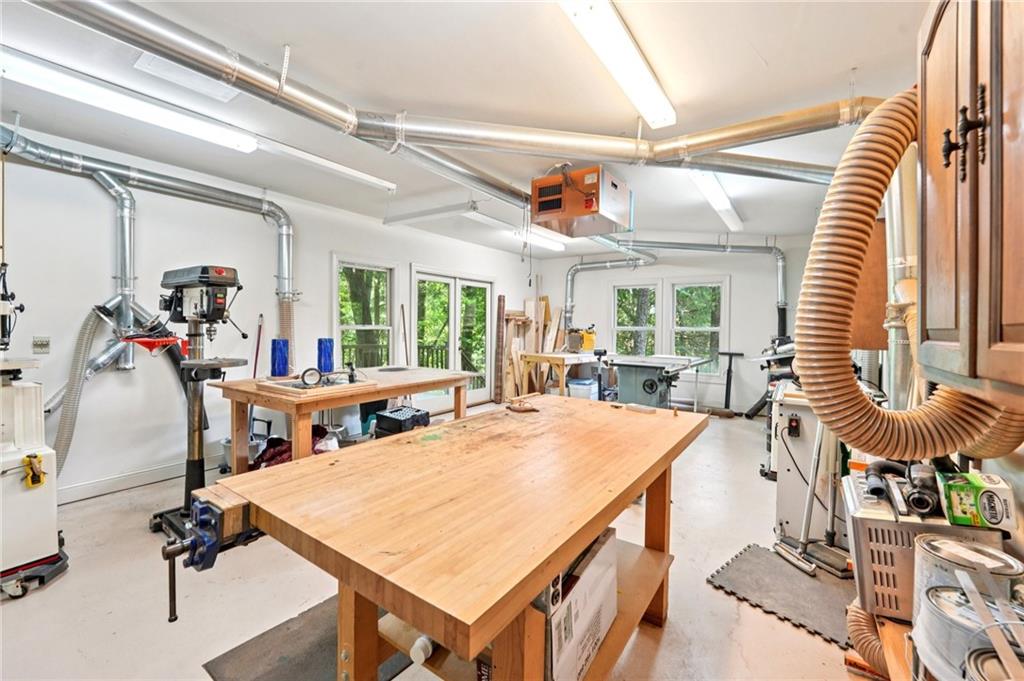 44 Sassafras Ridge Big Canoe, GA 30143 - Photo 64 of 107 a view of a livingroom with furniture and a table
