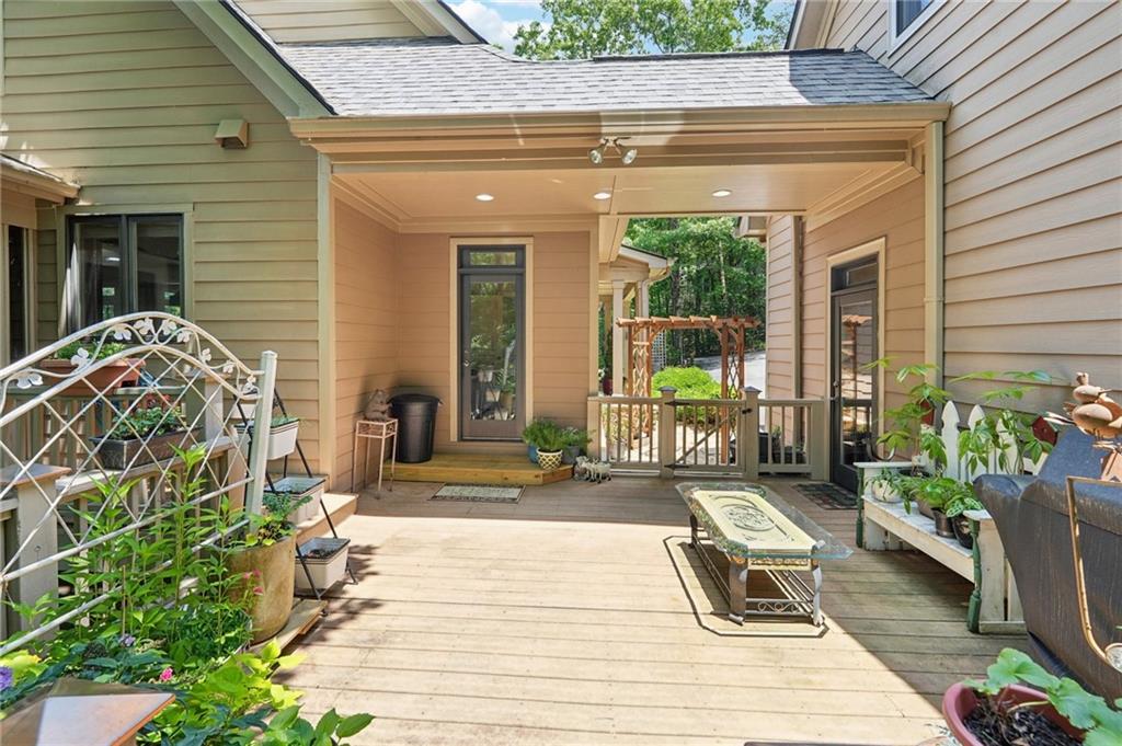 44 Sassafras Ridge Big Canoe, GA 30143 - Photo 72 of 107 a front view of a house with garden