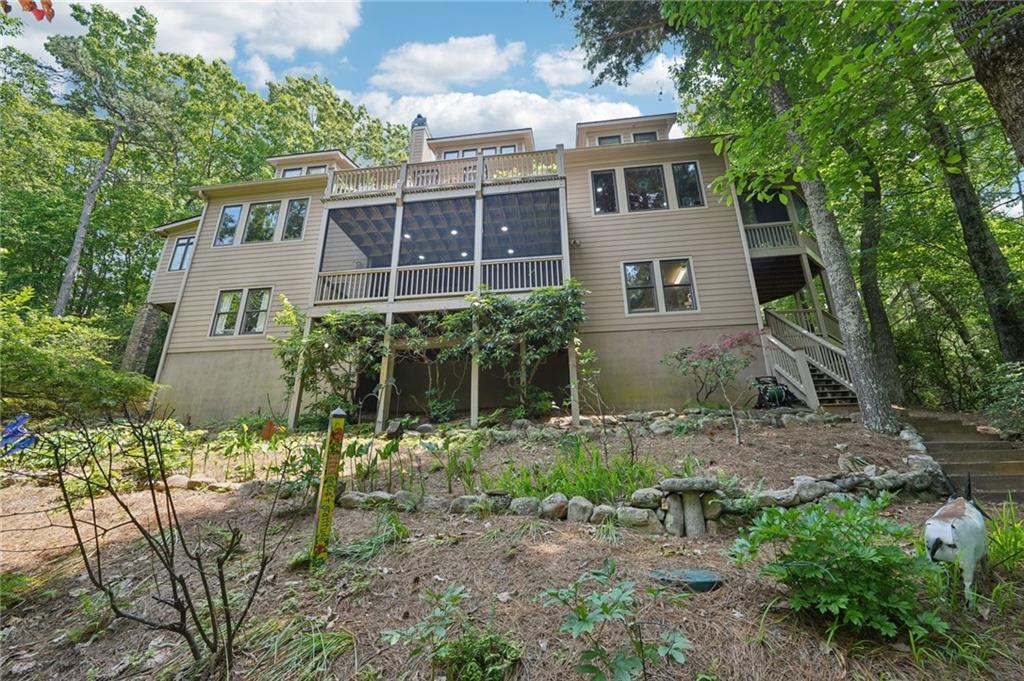 44 Sassafras Ridge Big Canoe, GA 30143 - Photo 83 of 107 a front view of a house with a yard
