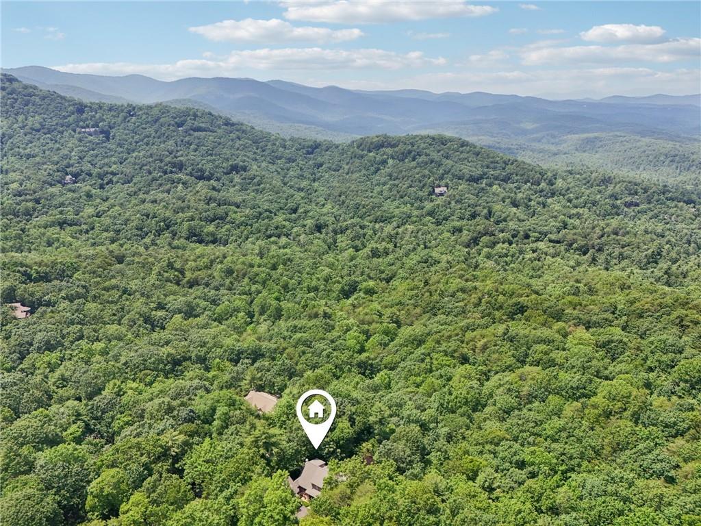 44 Sassafras Ridge Big Canoe, GA 30143 - Photo 91 of 107 a view of a lush green field with a mountain in the background