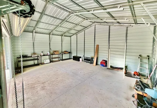 a view of a backyard with a patio