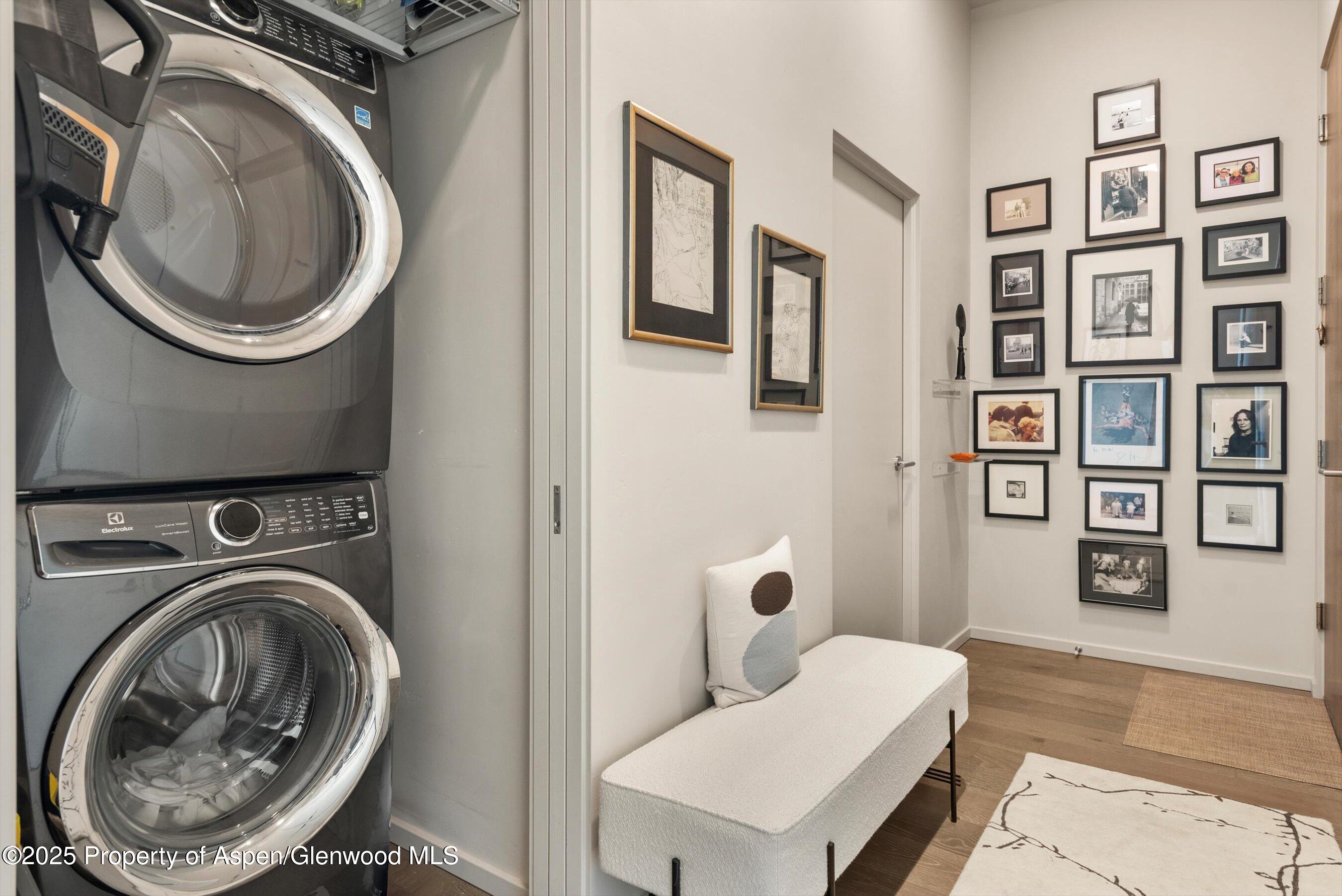 103 Willits Lane, Unit 204 Basalt, CO 81621 - Photo 23 of 24 a view of a bedroom with washer and dryer