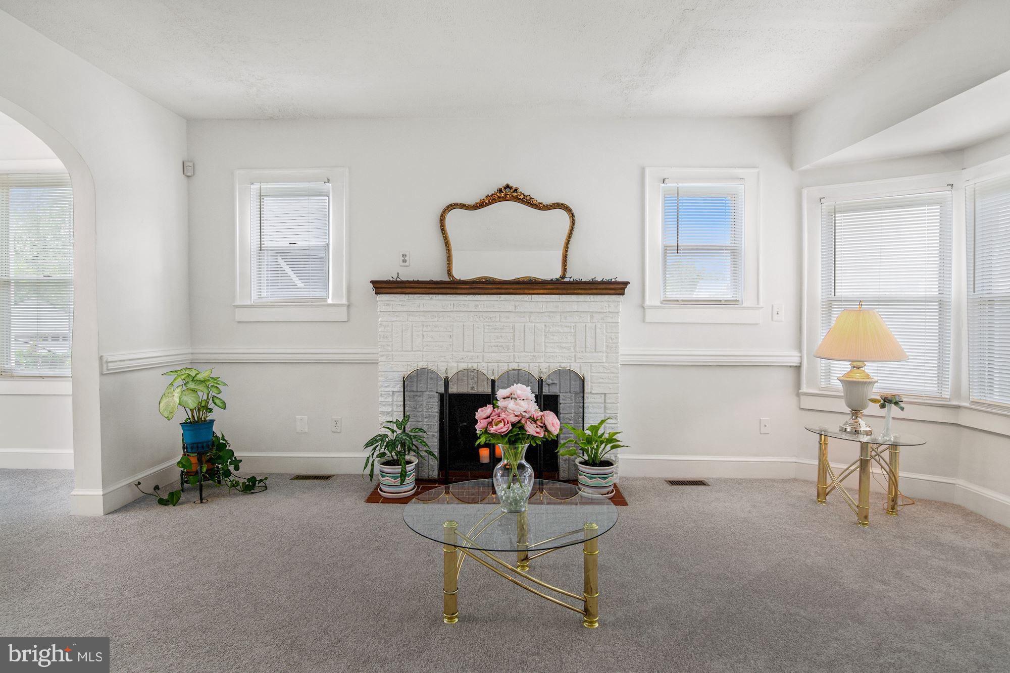 303 East Glebe Road Alexandria, VA 22305 - Photo 4 of 38 Wood burning fireplace in the living room