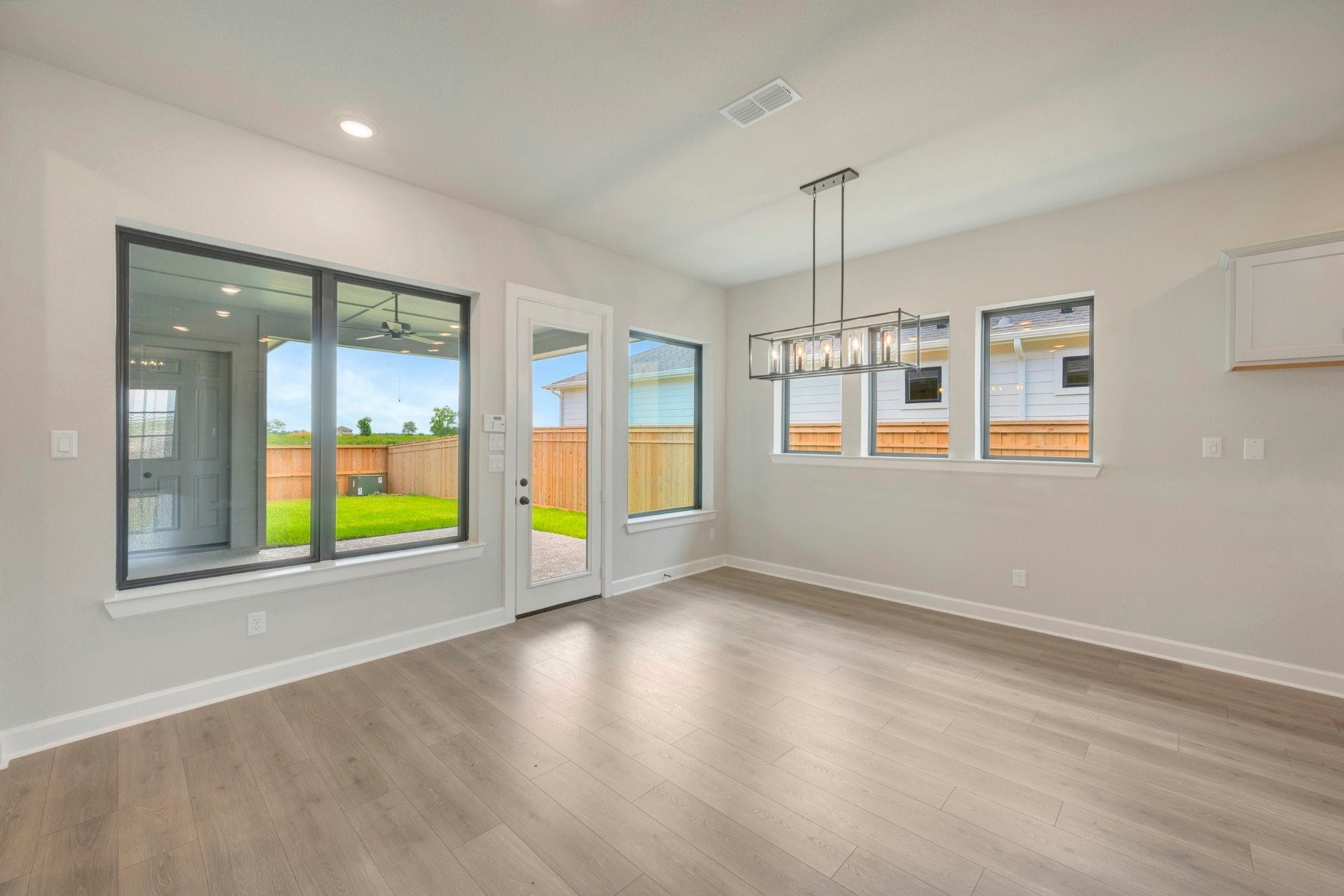 2722 Cottage Place Rosharon, TX 77583 - Photo 28 of 50 a view of an empty room with a window