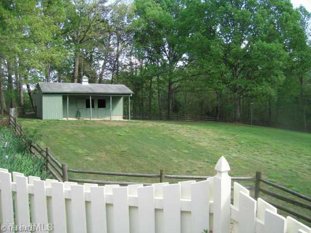 4745 Old Julian Road Julian, NC 27283 - Photo 3 of 16 Stable/Barn. 3 Stall horse barn and pasture area.