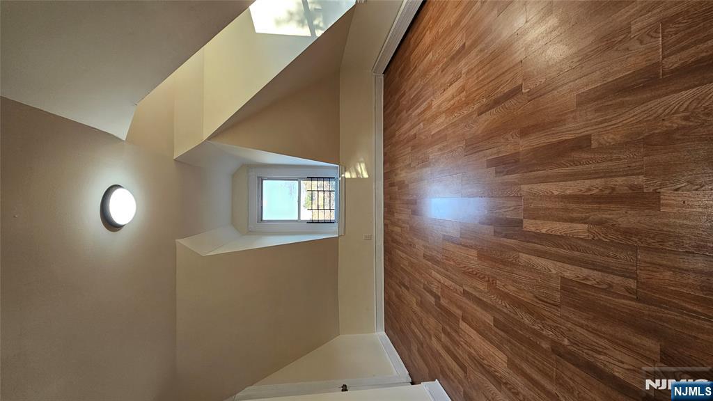 78 North Arlington Avenue, Unit 3 East Orange, NJ 07017 - Photo 1 of 13 a view of room with wooden floor