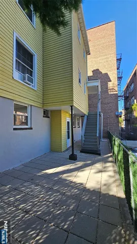 a view of a house with swimming pool