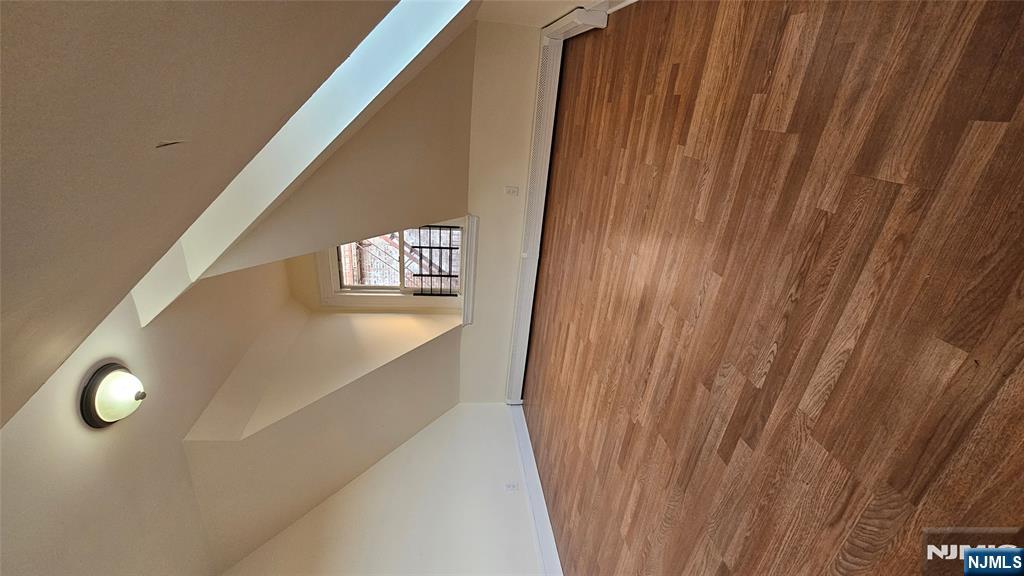 78 North Arlington Avenue, Unit 3 East Orange, NJ 07017 - Photo 2 of 13 a view of a room with wooden floor