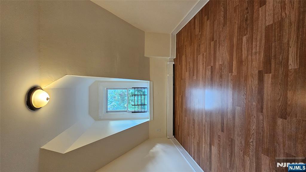 78 North Arlington Avenue, Unit 3 East Orange, NJ 07017 - Photo 6 of 13 a view of a room with wooden floor