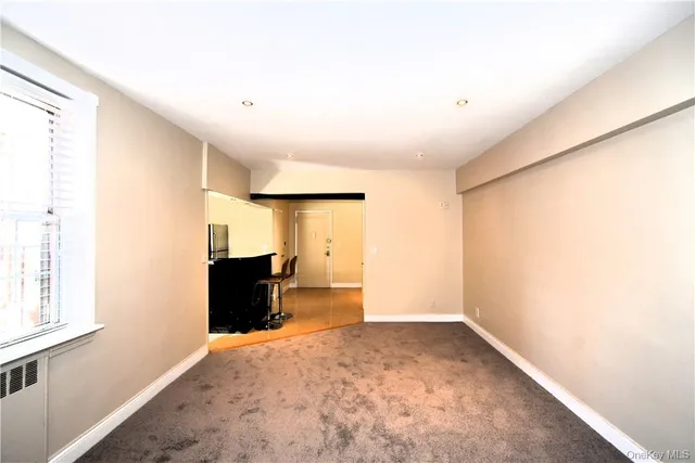 an empty room with a window