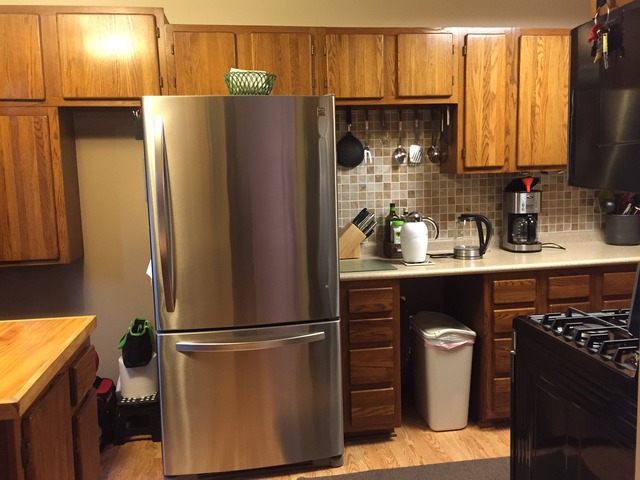 3638 Harlem Avenue Riverside, IL 60546 - Photo 13 of 21 a kitchen with a refrigerator and a stove