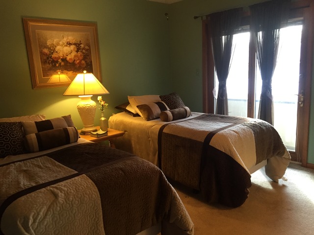 3638 Harlem Avenue Riverside, IL 60546 - Photo 3 of 21 a bed sitting in a bedroom next to a window
