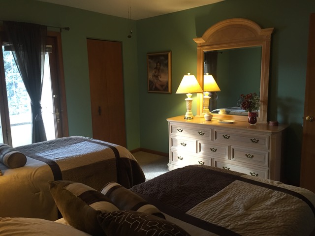 3638 Harlem Avenue Riverside, IL 60546 - Photo 4 of 21 a bedroom with a bed and a dresser