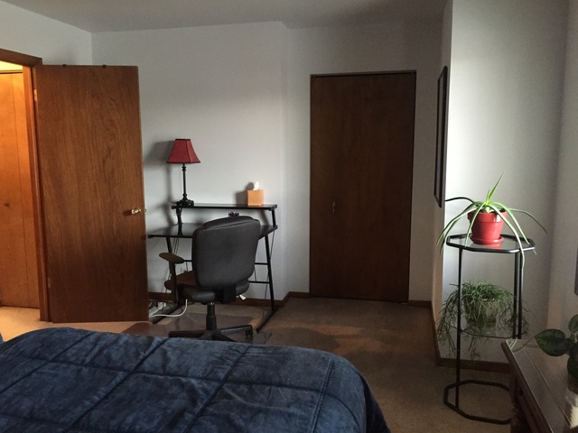 3638 Harlem Avenue Riverside, IL 60546 - Photo 6 of 21 a workspace with furniture and a potted plant