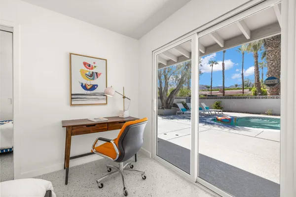 a room with furniture and a window
