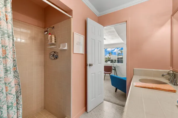a bathroom with a bathtub and sink