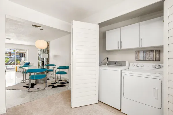 a view of kitchen center island and appliances