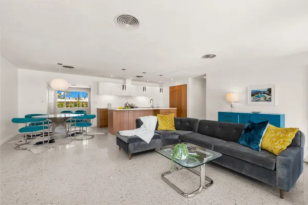 a living room with furniture and a couch