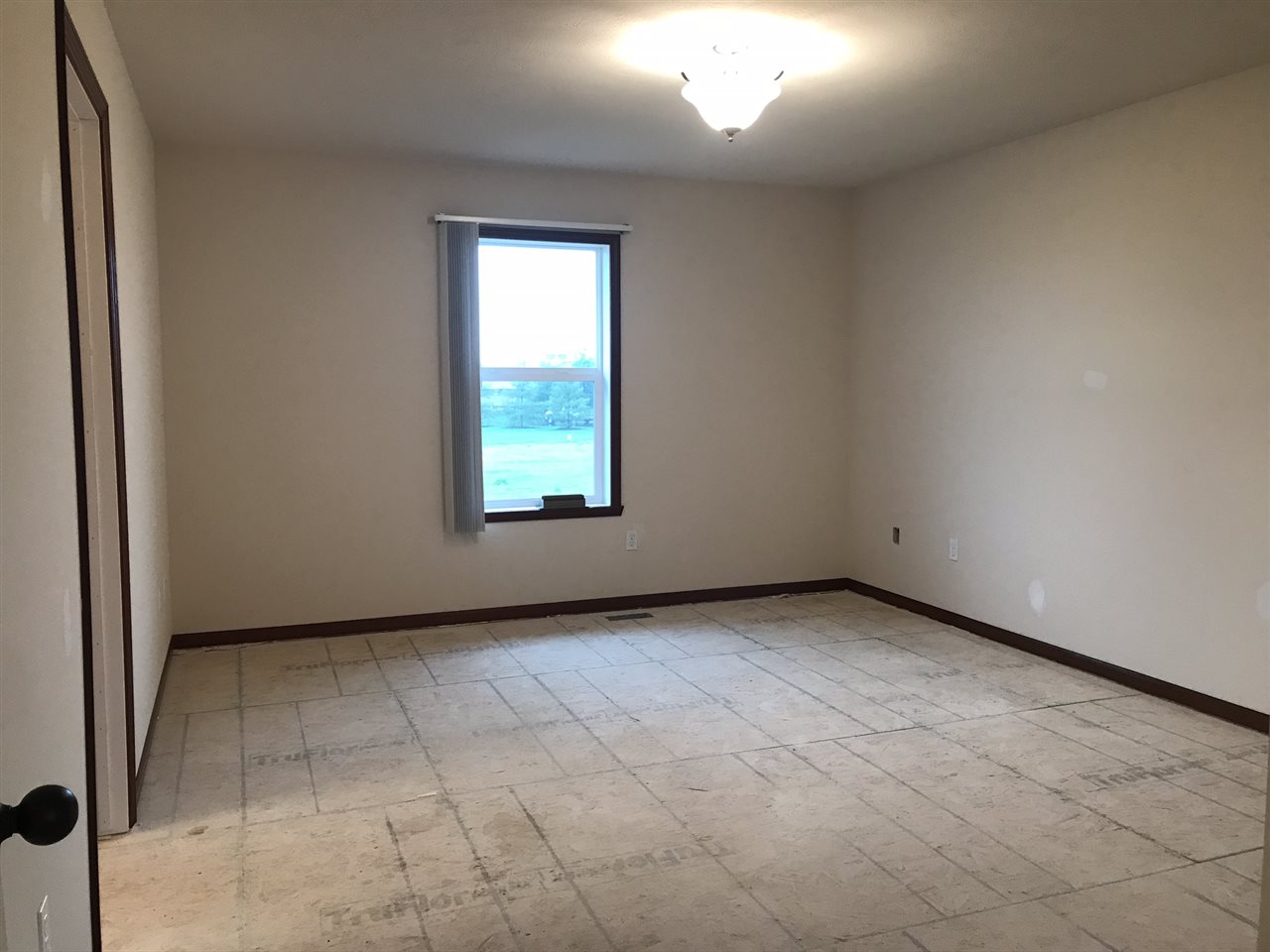 6915 Winterberry Road Loves Park, IL 61111 - Photo 9 of 15 an empty room with windows