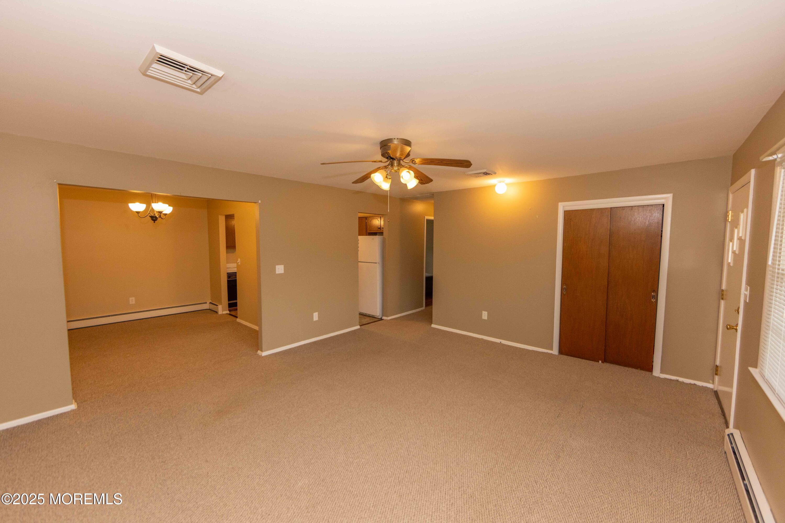 31 Southampton Road Toms River, NJ 08757 - Photo 3 of 14 a view of an empty room with a ceiling fan