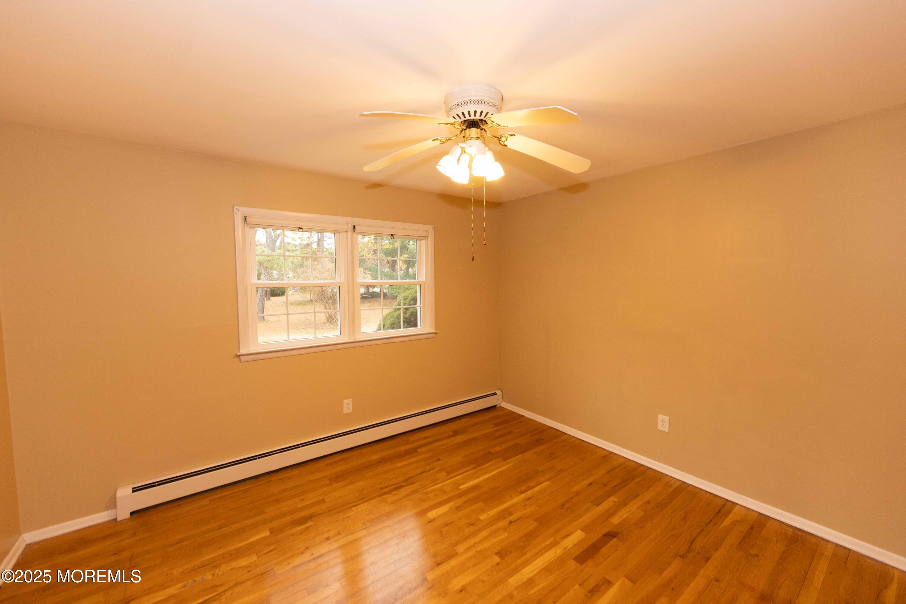 31 Southampton Road Toms River, NJ 08757 - Photo 7 of 14 a view of an empty room with a window