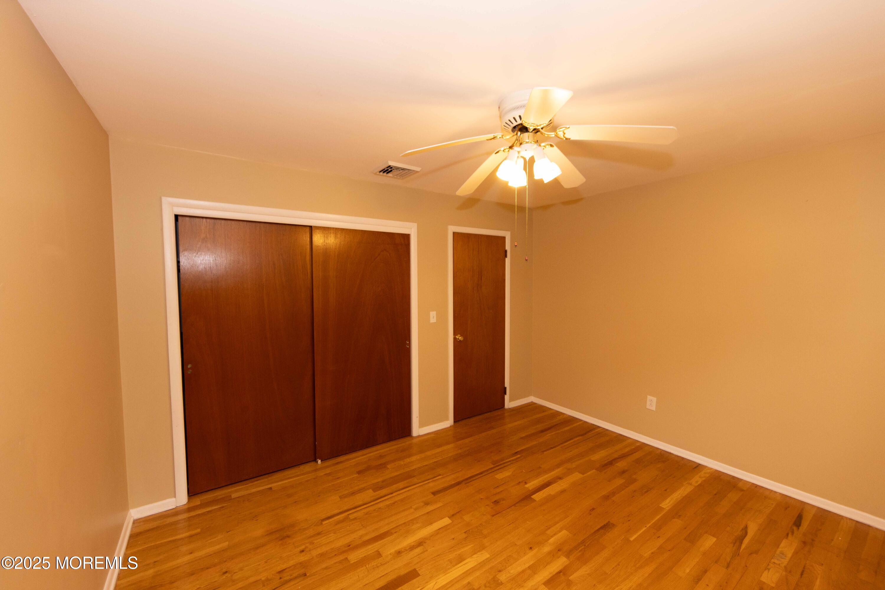 31 Southampton Road Toms River, NJ 08757 - Photo 9 of 14 a view of empty room with a ceiling fan