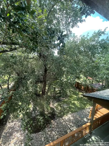 a view of swimming pool with a patio