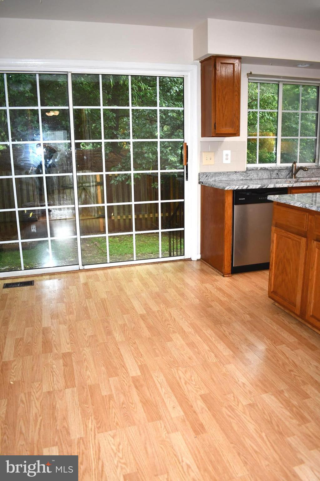 14721 Basingstoke Loop Centreville, VA 20120 - Photo 6 of 17 Dining Room leads to the fenced backyard patio