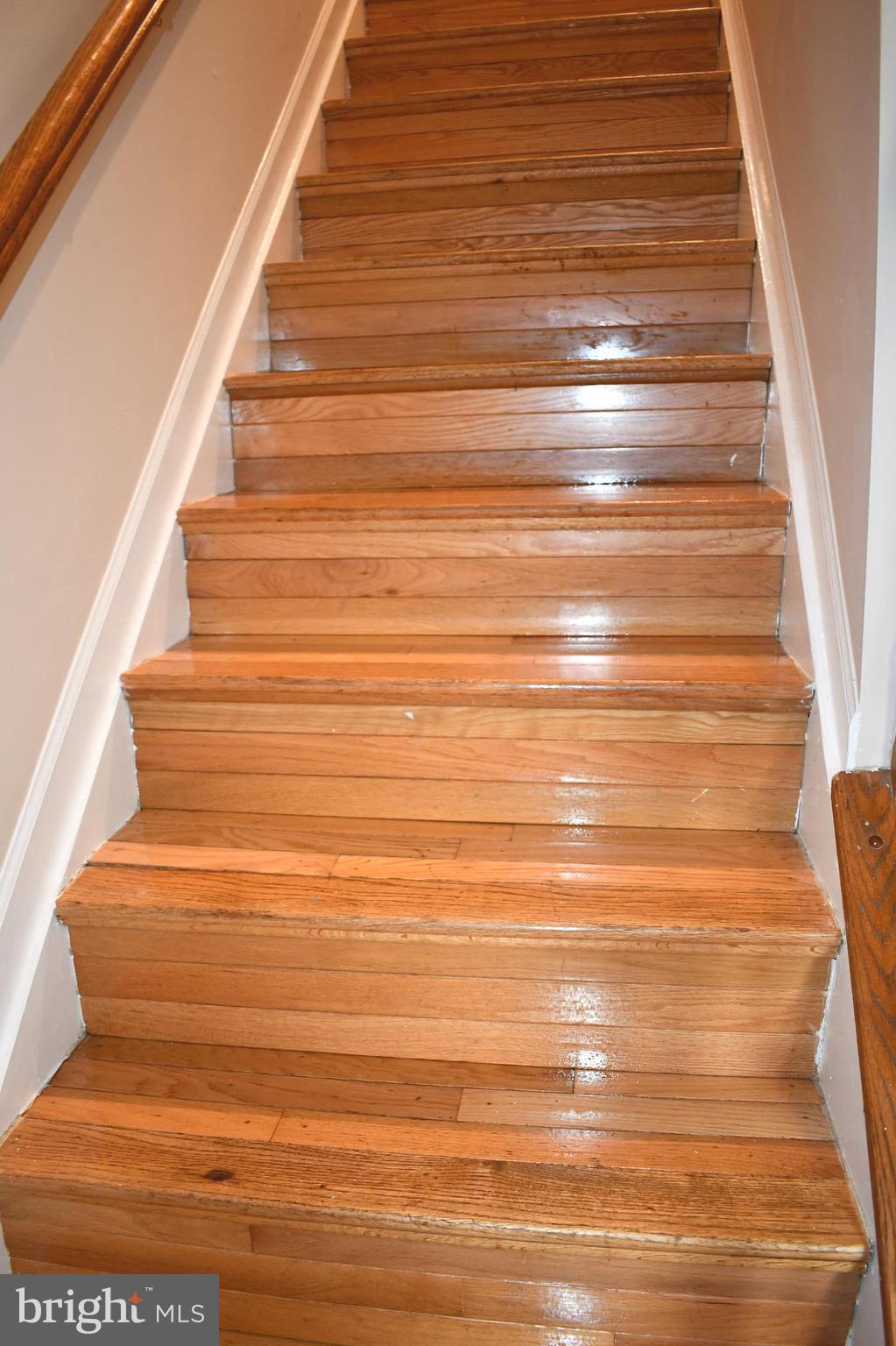14721 Basingstoke Loop Centreville, VA 20120 - Photo 7 of 17 Hardwood Steps to upper level