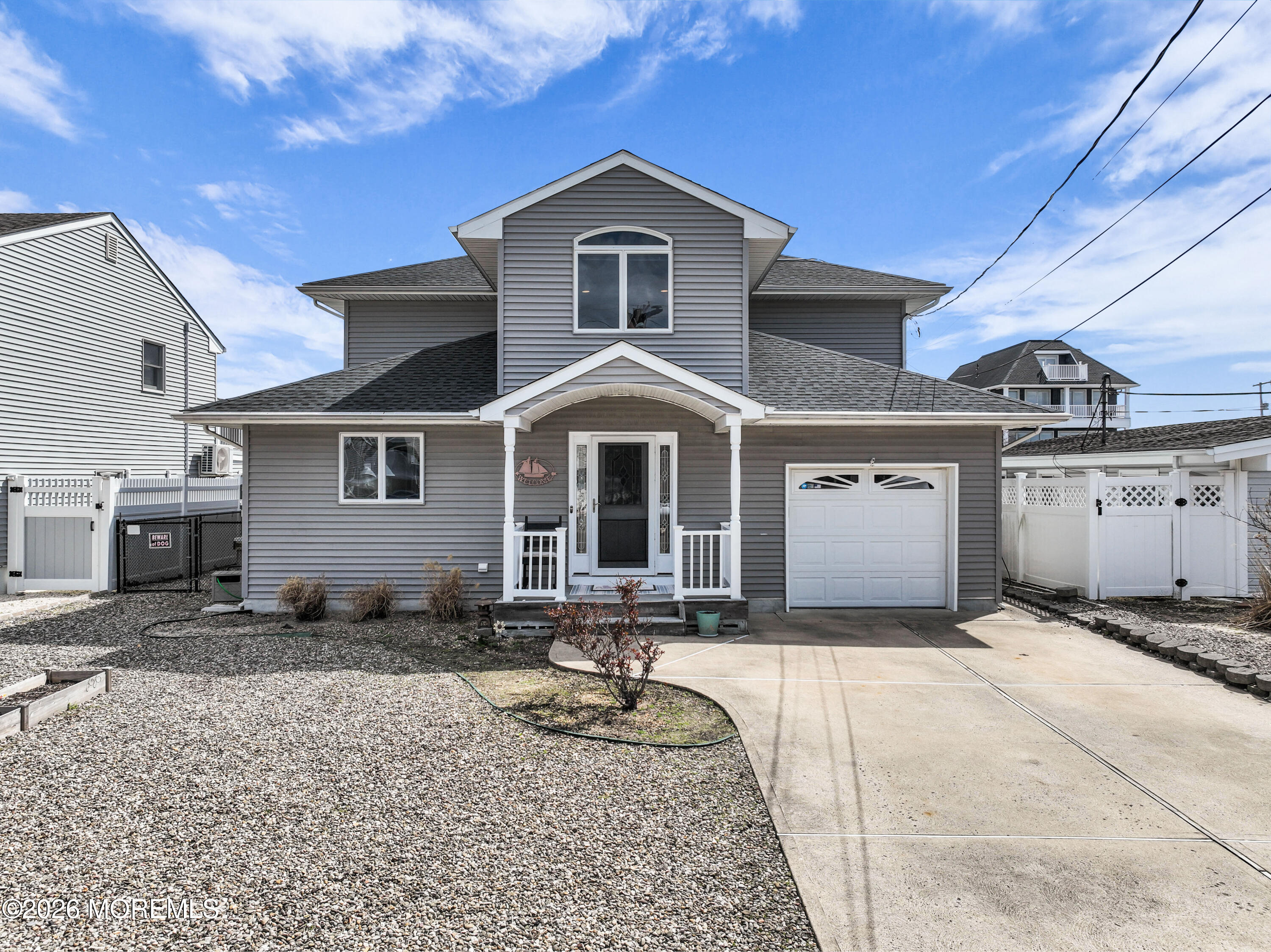 a front view of a house with yard