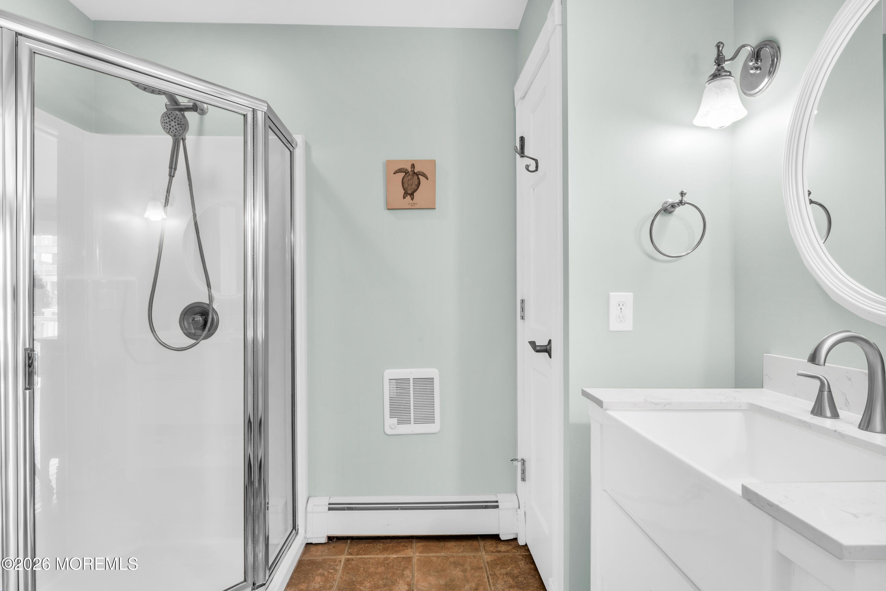 39 Pilot Road Toms River, NJ 08753 - Photo 12 of 34 a bathroom with a shower sink vanity and mirror