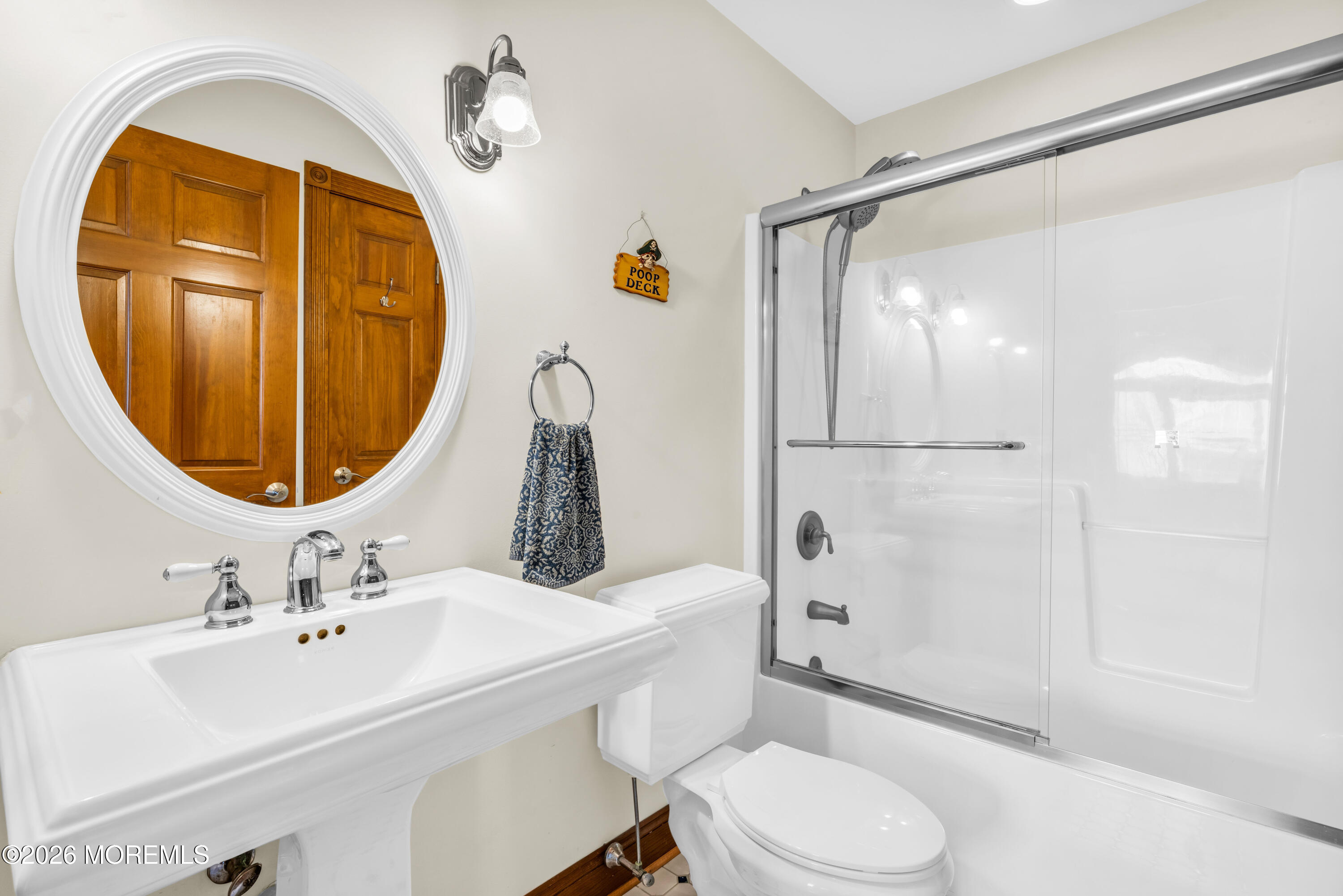 39 Pilot Road Toms River, NJ 08753 - Photo 19 of 34 a bathroom with a sink toilet and shower