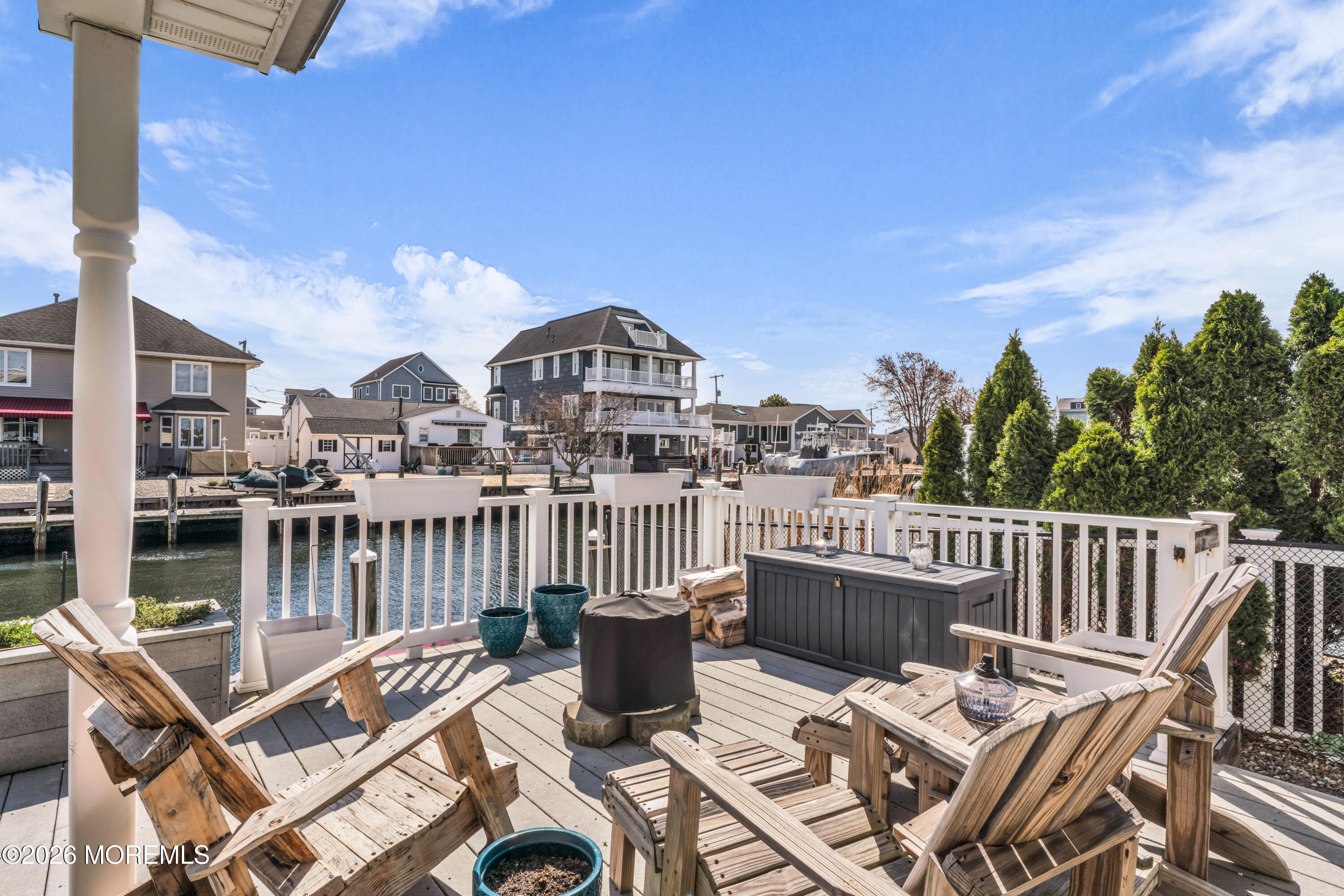 39 Pilot Road Toms River, NJ 08753 - Photo 21 of 34 a view of a balcony with two chairs and a table