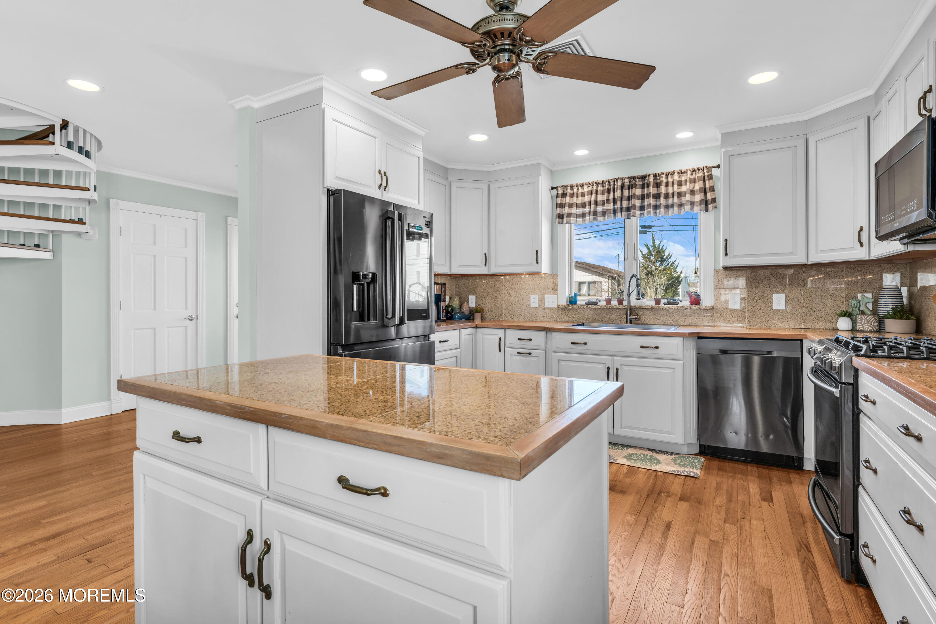 39 Pilot Road Toms River, NJ 08753 - Photo 4 of 34 a kitchen with stainless steel appliances granite countertop a sink stove and refrigerator
