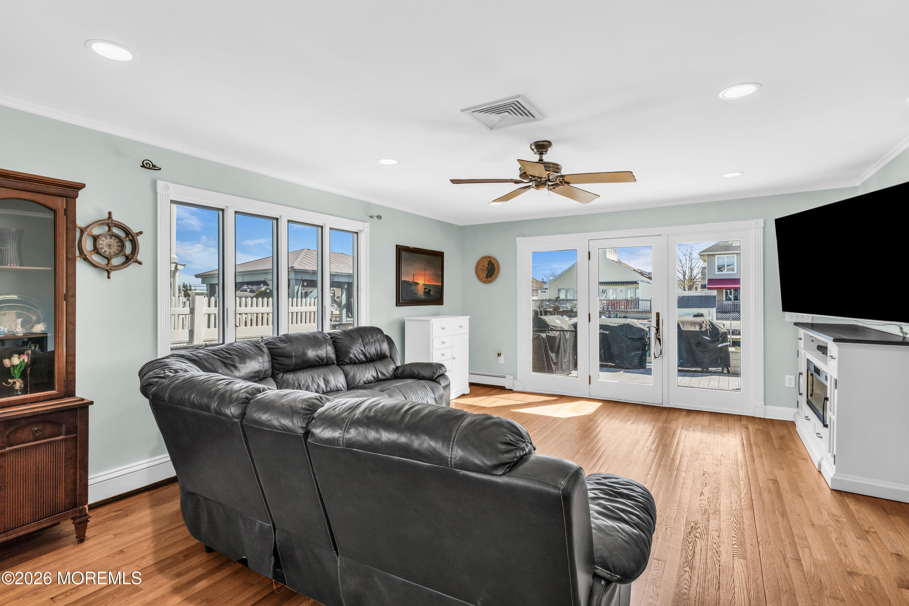 39 Pilot Road Toms River, NJ 08753 - Photo 7 of 34 a living room with furniture and a flat screen tv