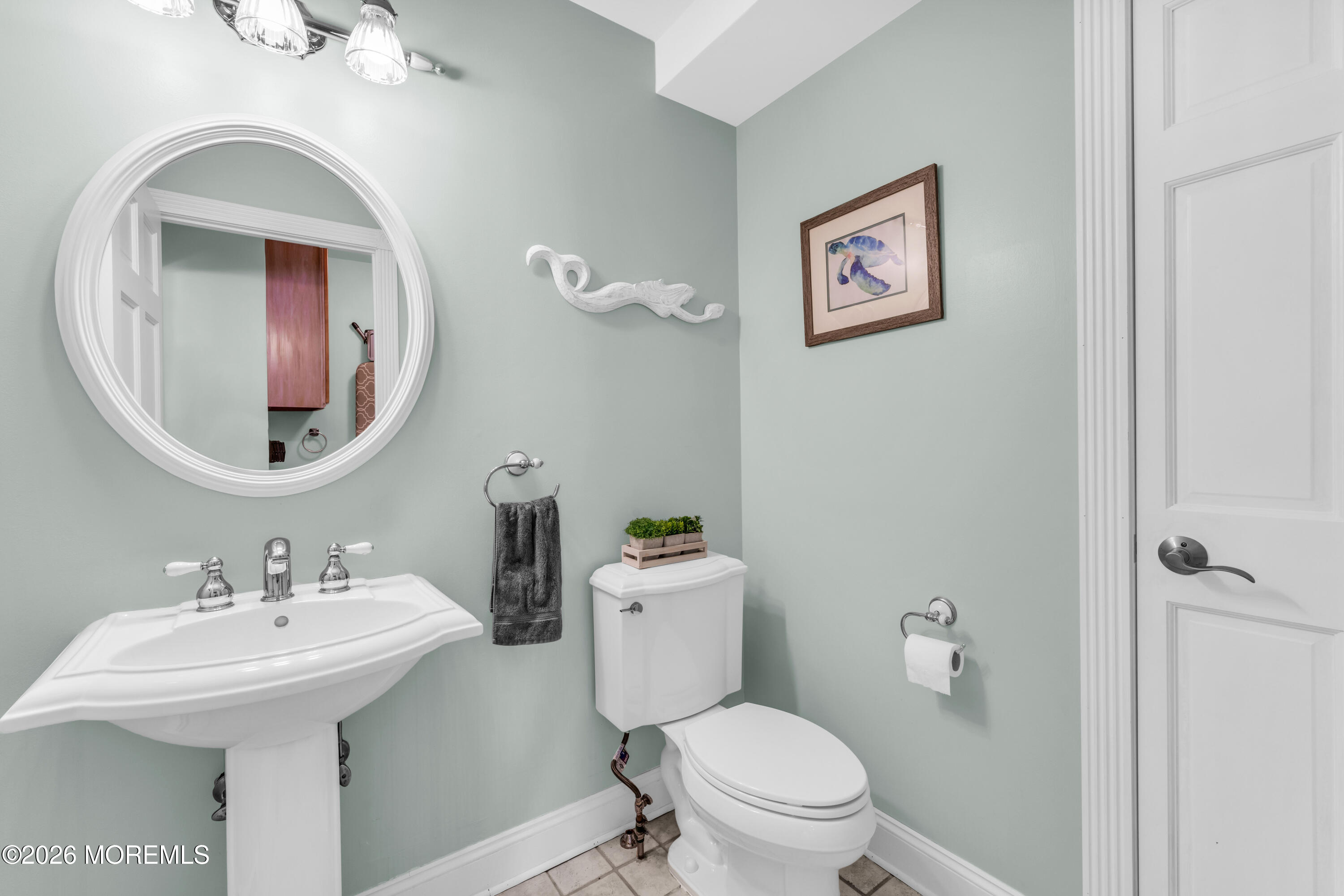 39 Pilot Road Toms River, NJ 08753 - Photo 8 of 34 a bathroom with a toilet sink and mirror