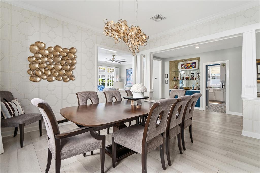 824 South Rome Avenue Tampa, FL 33606 - Photo 11 of 45 a view of a dining room with furniture and wooden floor