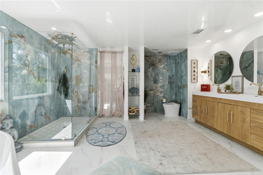 824 South Rome Avenue Tampa, FL 33606 - Photo 30 of 45 a bathroom with a double vanity sink toilet and shower