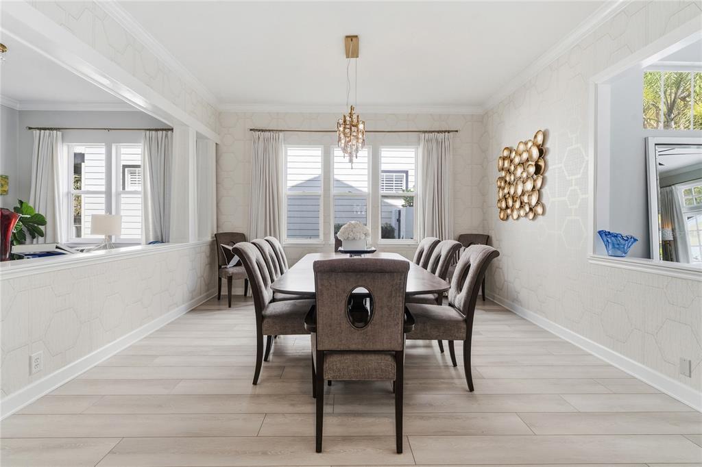 824 South Rome Avenue Tampa, FL 33606 - Photo 5 of 45 a view of a a dining room with furniture window and wooden floor