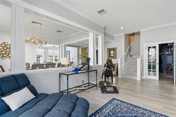 a view of swimming pool with a outdoor seating