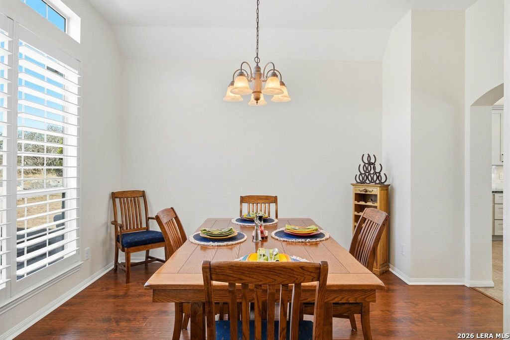 318 River Ridge Boerne, TX 78006 - Photo 8 of 46 a view of a dining room with furniture and wooden floor